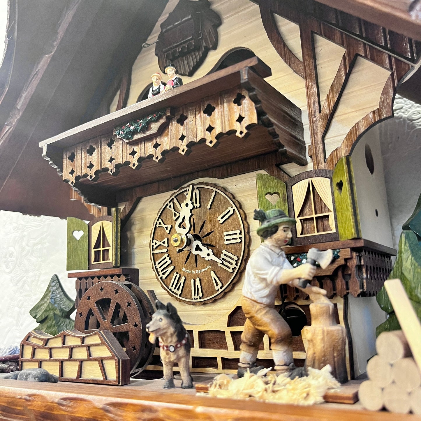 Musical cuckoo clock with wood cutter, water wheel & German farm dance - one day mechanical Movement