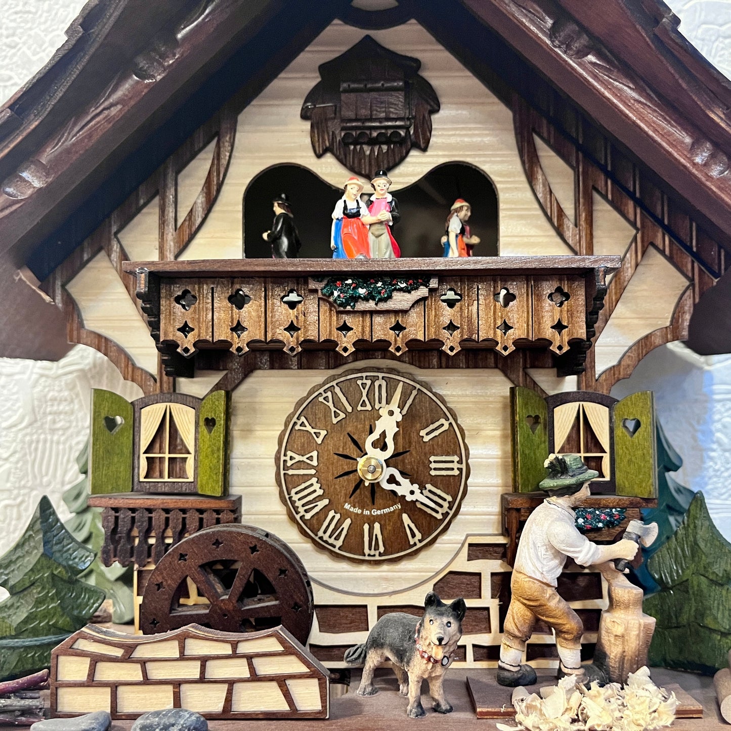 Musical cuckoo clock with wood cutter, water wheel & German farm dance - one day mechanical Movement