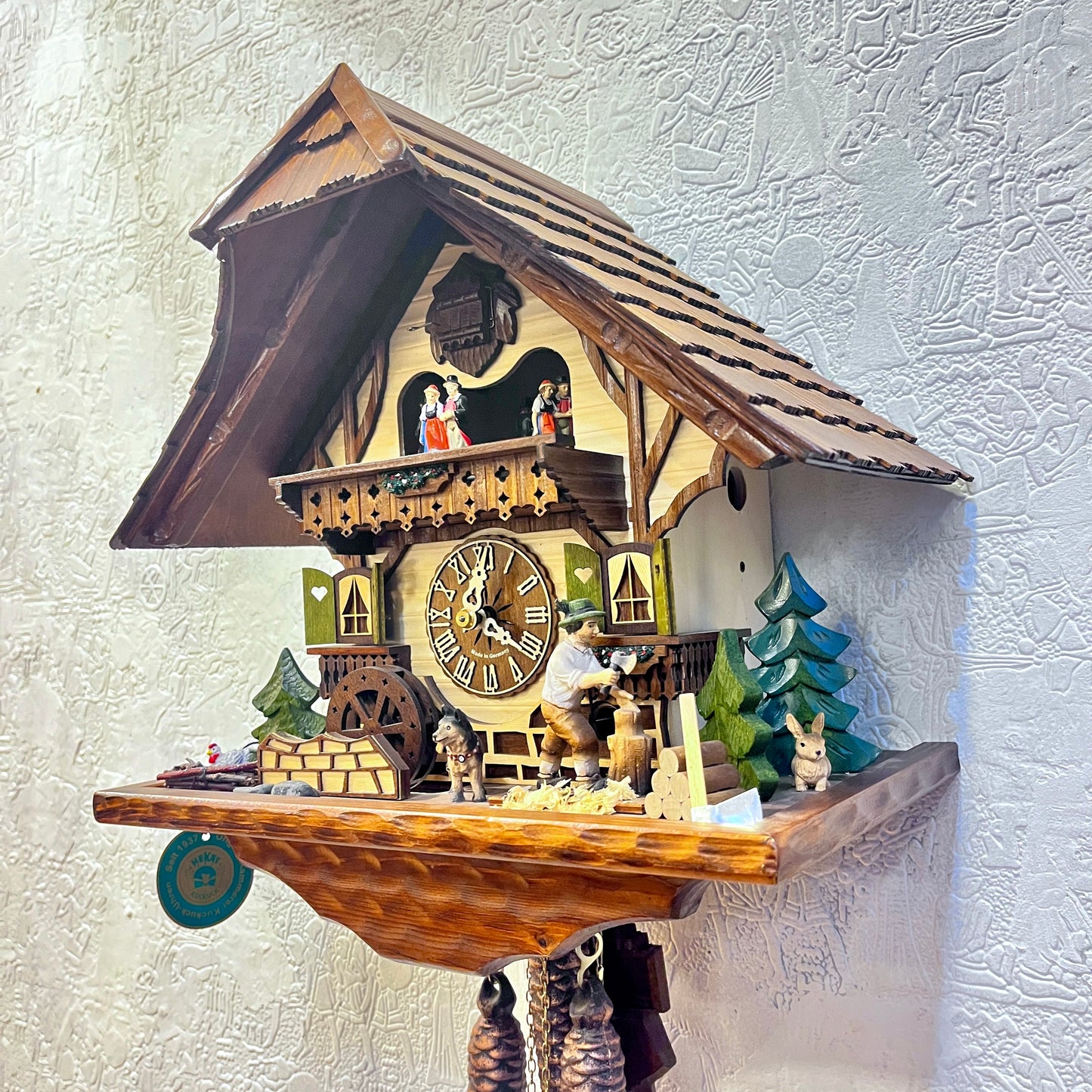 Musical cuckoo clock with wood cutter, water wheel & German farm dance - one day mechanical Movement