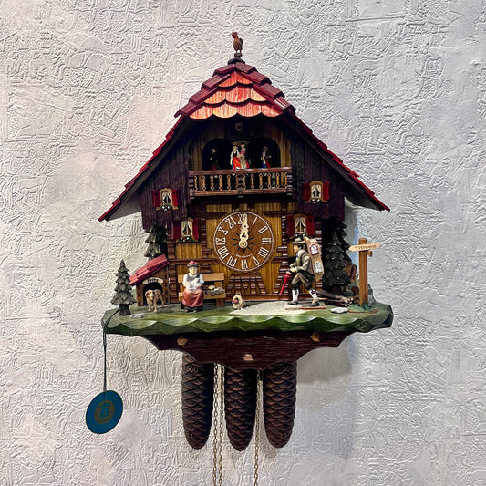 Musical 8 day mechanical cuckoo clock with clock seller and German farm dance movement