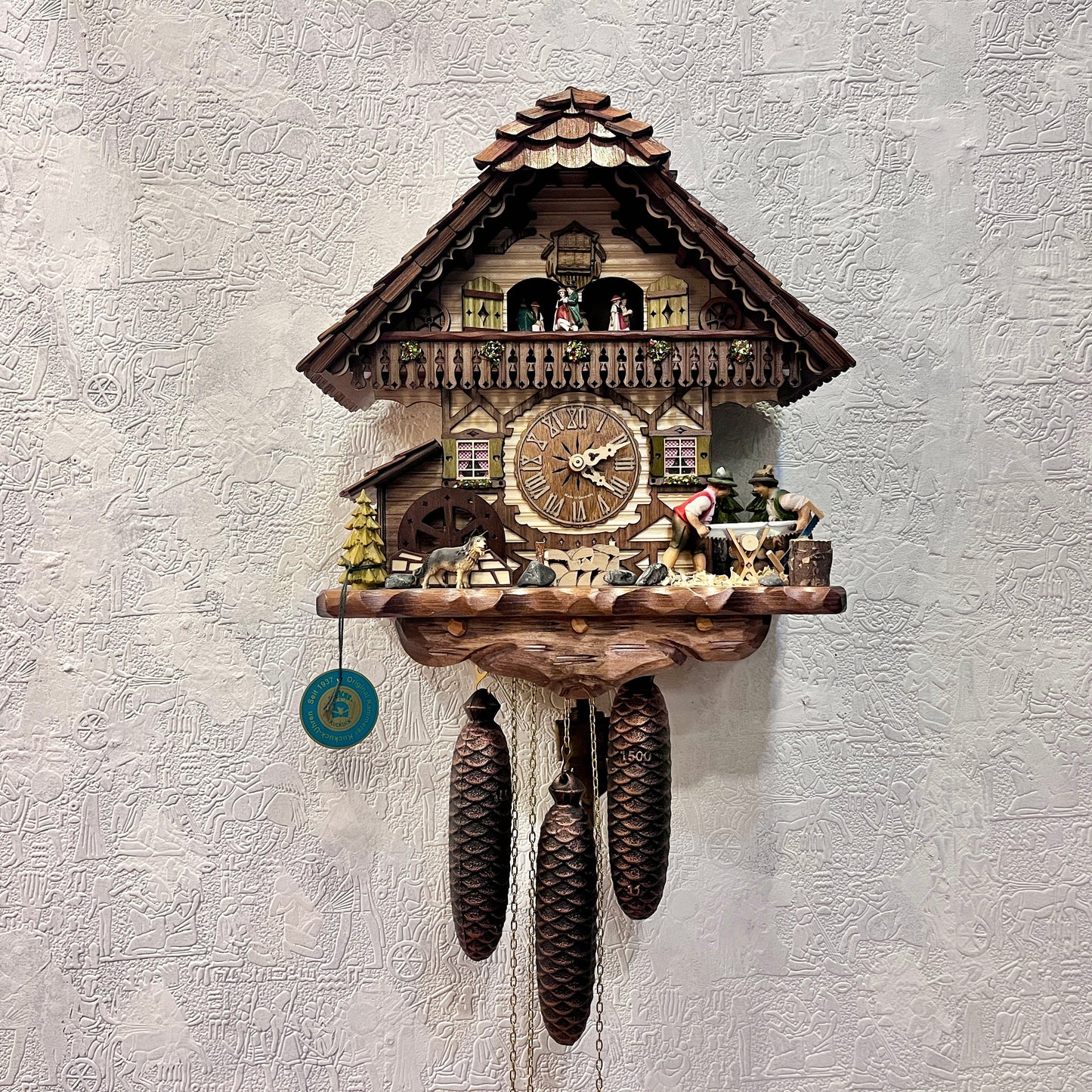 Musical German Cuckoo Clock With Sawing Men And Water Wheel