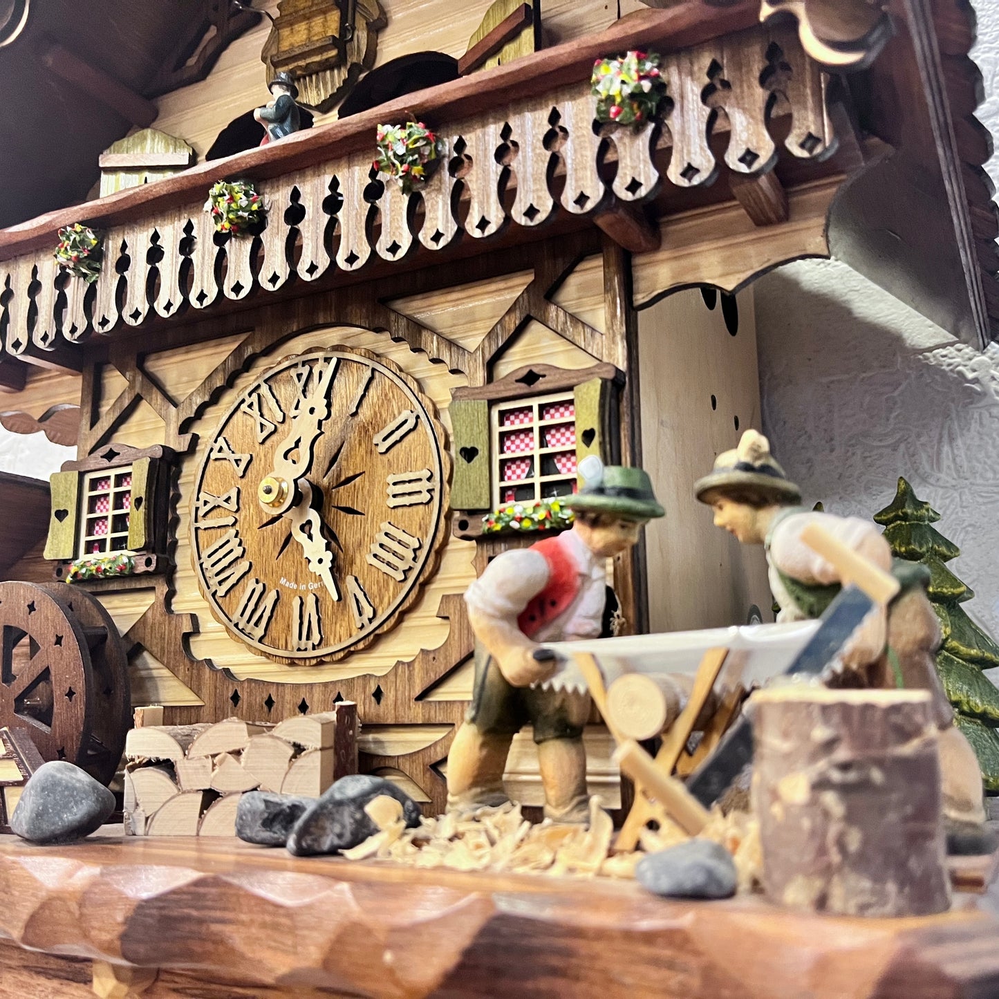 Musical German Cuckoo Clock With Sawing Men And Water Wheel