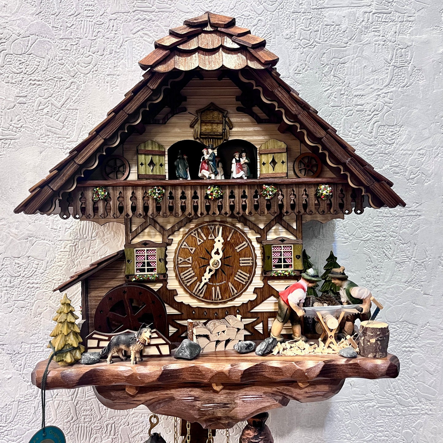 Musical German Cuckoo Clock With Sawing Men And Water Wheel