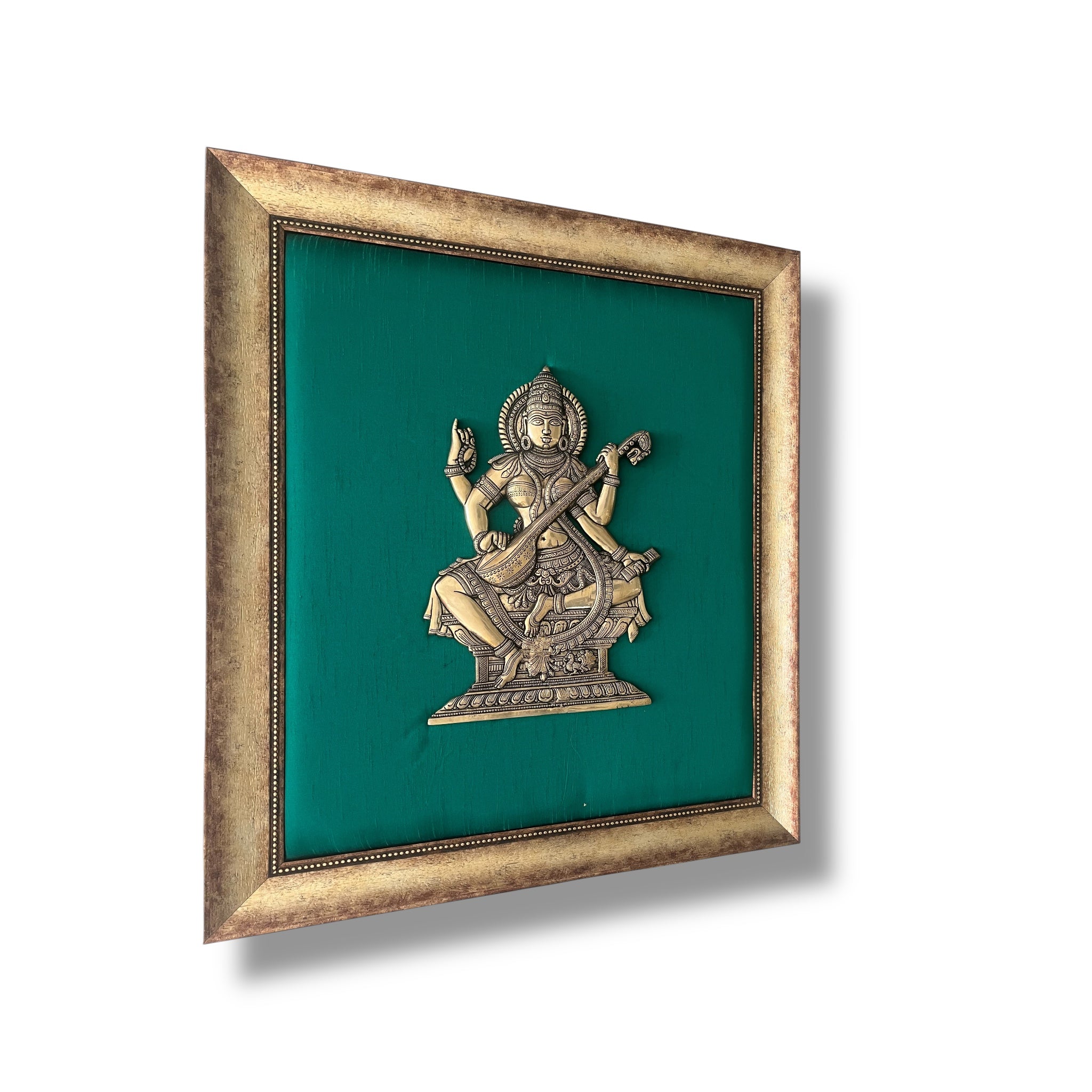 Brass Saraswati on Silk Backdrop in Antique Gold Resin Frame
