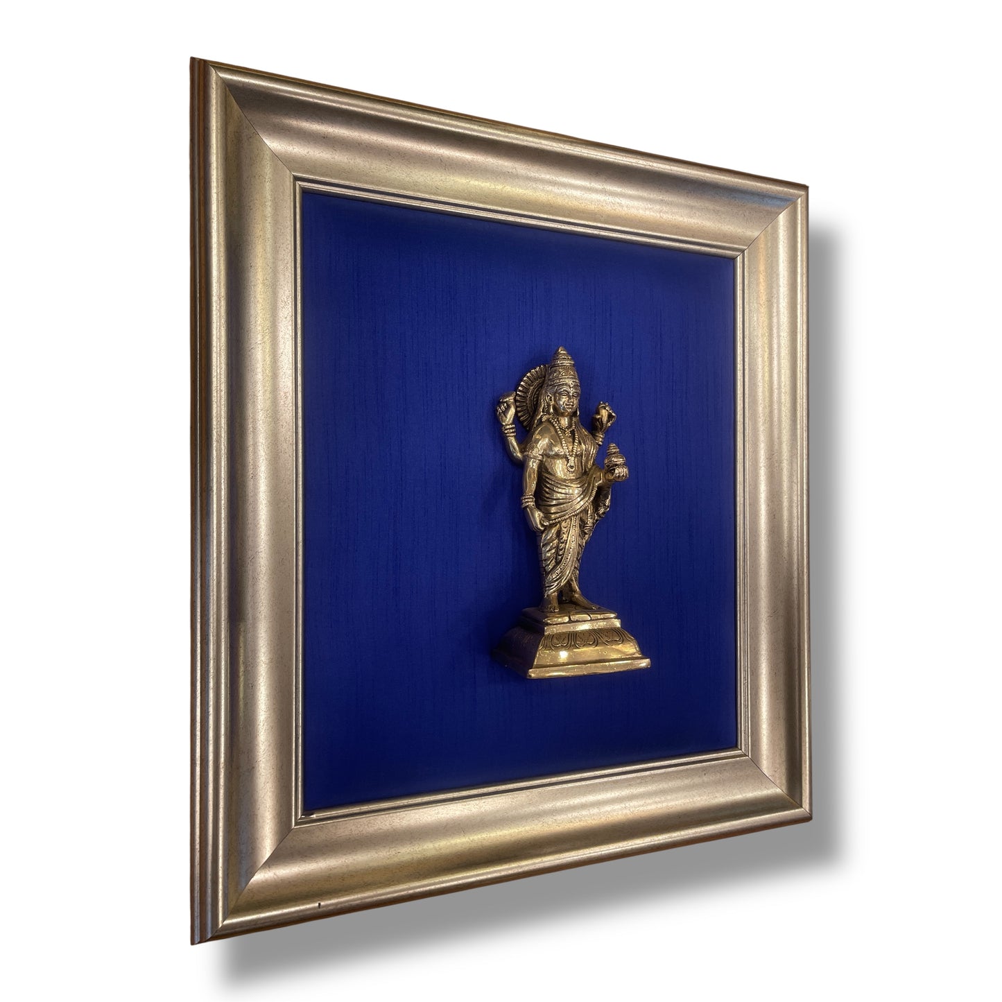 Divine Dhanvantari Wall Art – Brass Idol on Elegant Blue Silk in Moulded Frame