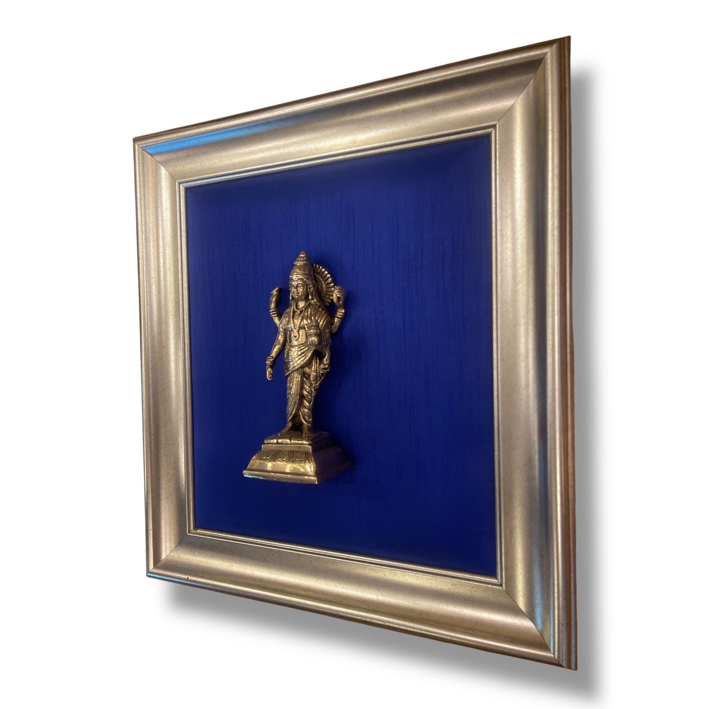 Divine Dhanvantari Wall Art – Brass Idol on Elegant Blue Silk in Moulded Frame