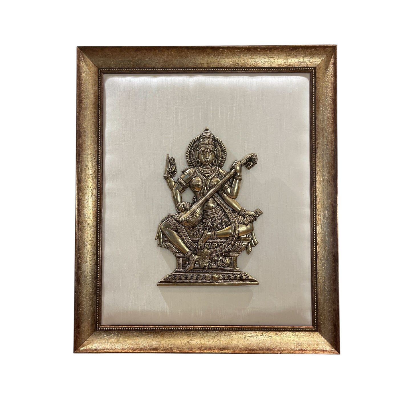 Brass Saraswati on White silk Backdrop in Wooden frame