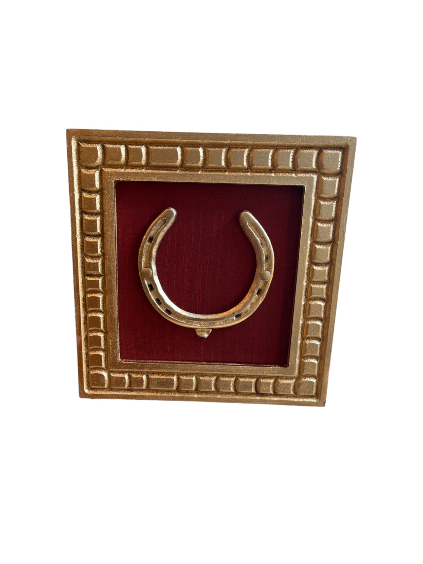 Good Luck Brass Horse Shoe with a wine red silk background with gold wooden frame