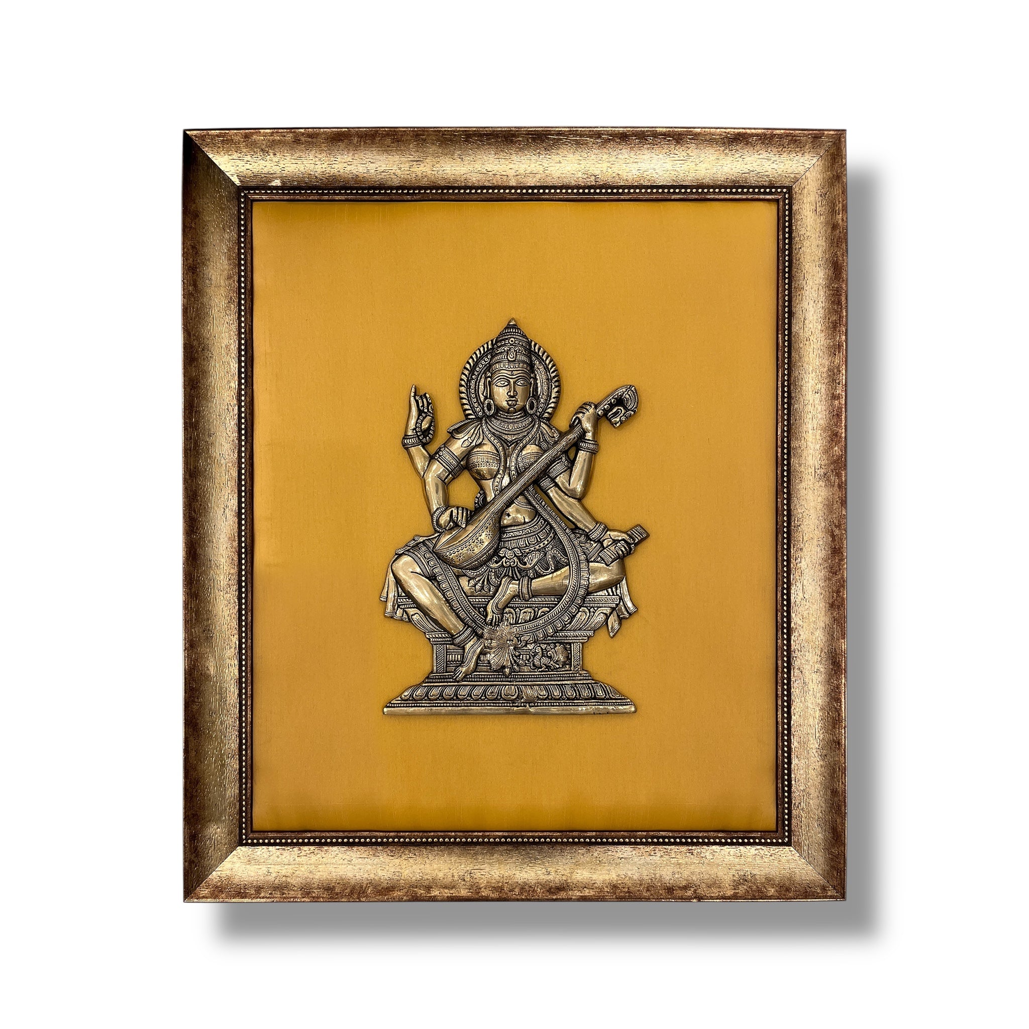 Brass Saraswati on Silk Backdrop in Antique Gold Resin Frame
