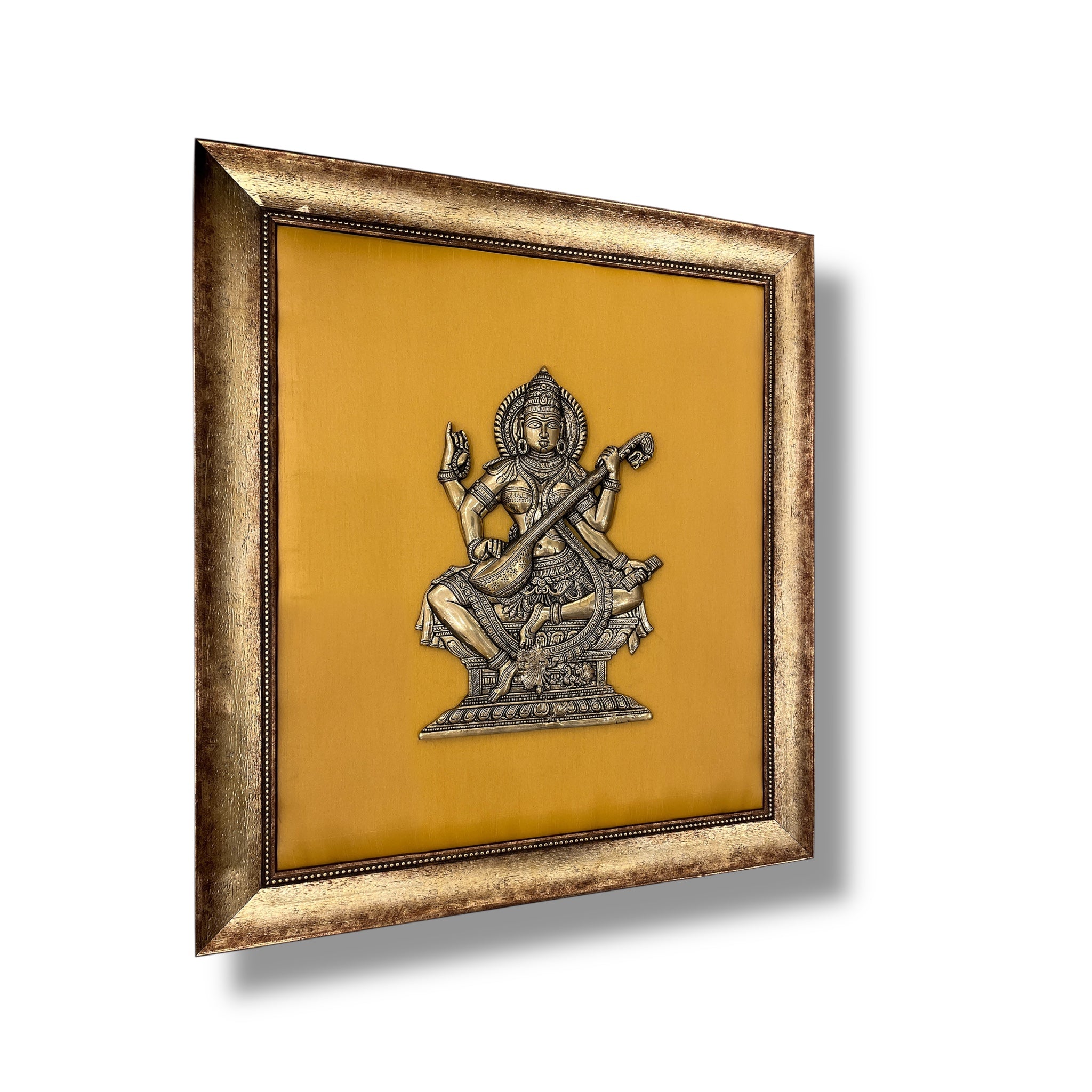 Brass Saraswati on Silk Backdrop in Antique Gold Resin Frame