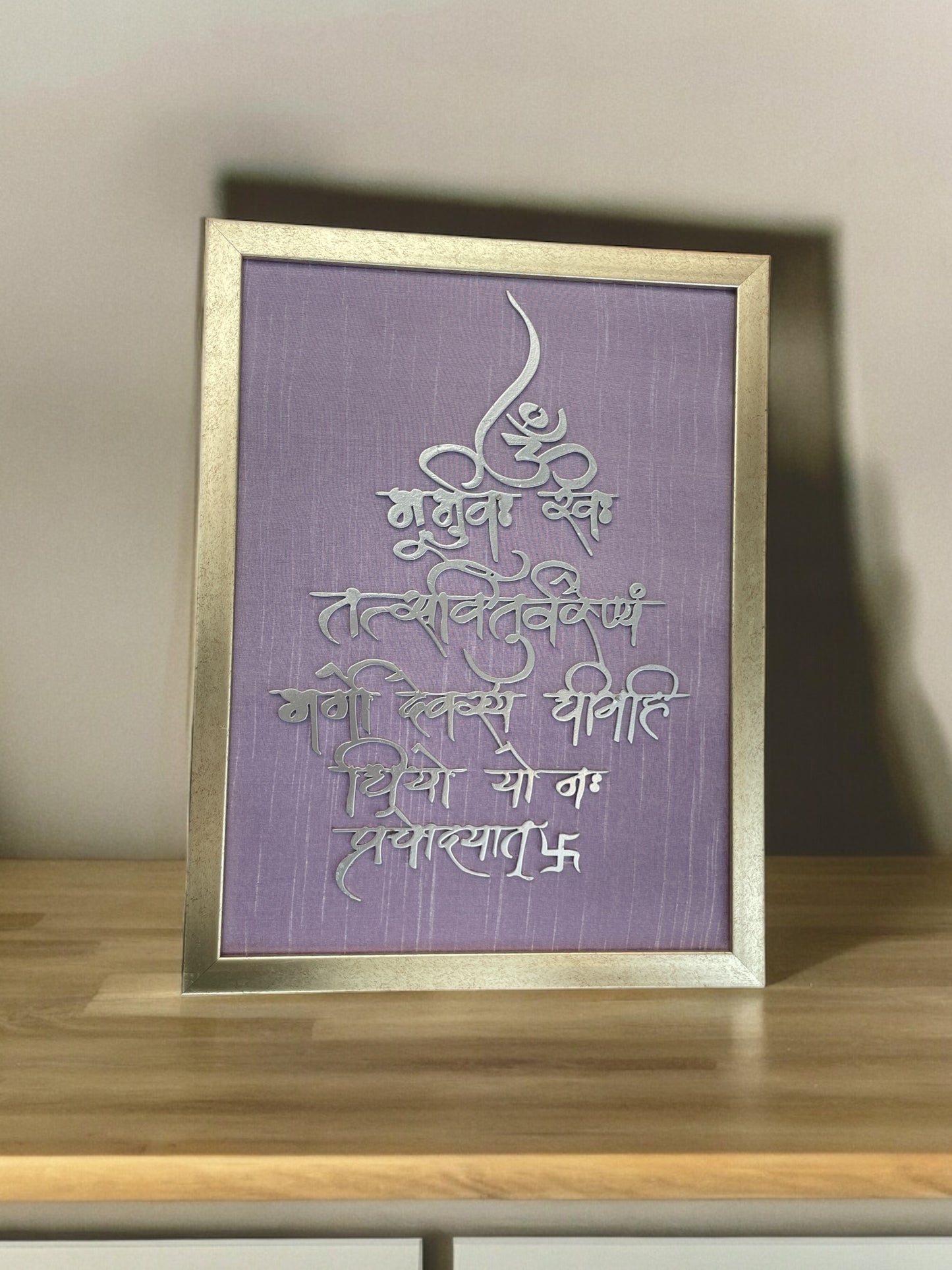 Gayatri Mantra brass with violet silk backdrop