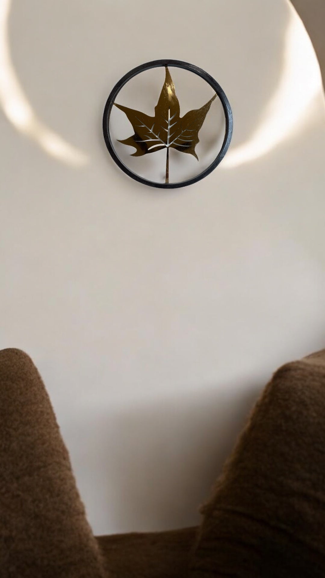 Titanium Maple Leaf Within a Circular Wooden Frame