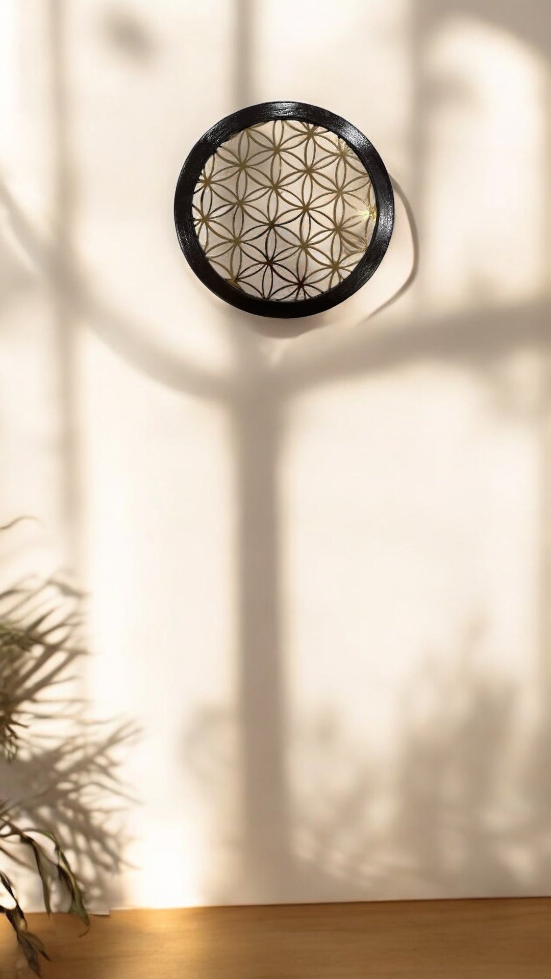 Titanium Flower of Life within a Circular wooden Frame