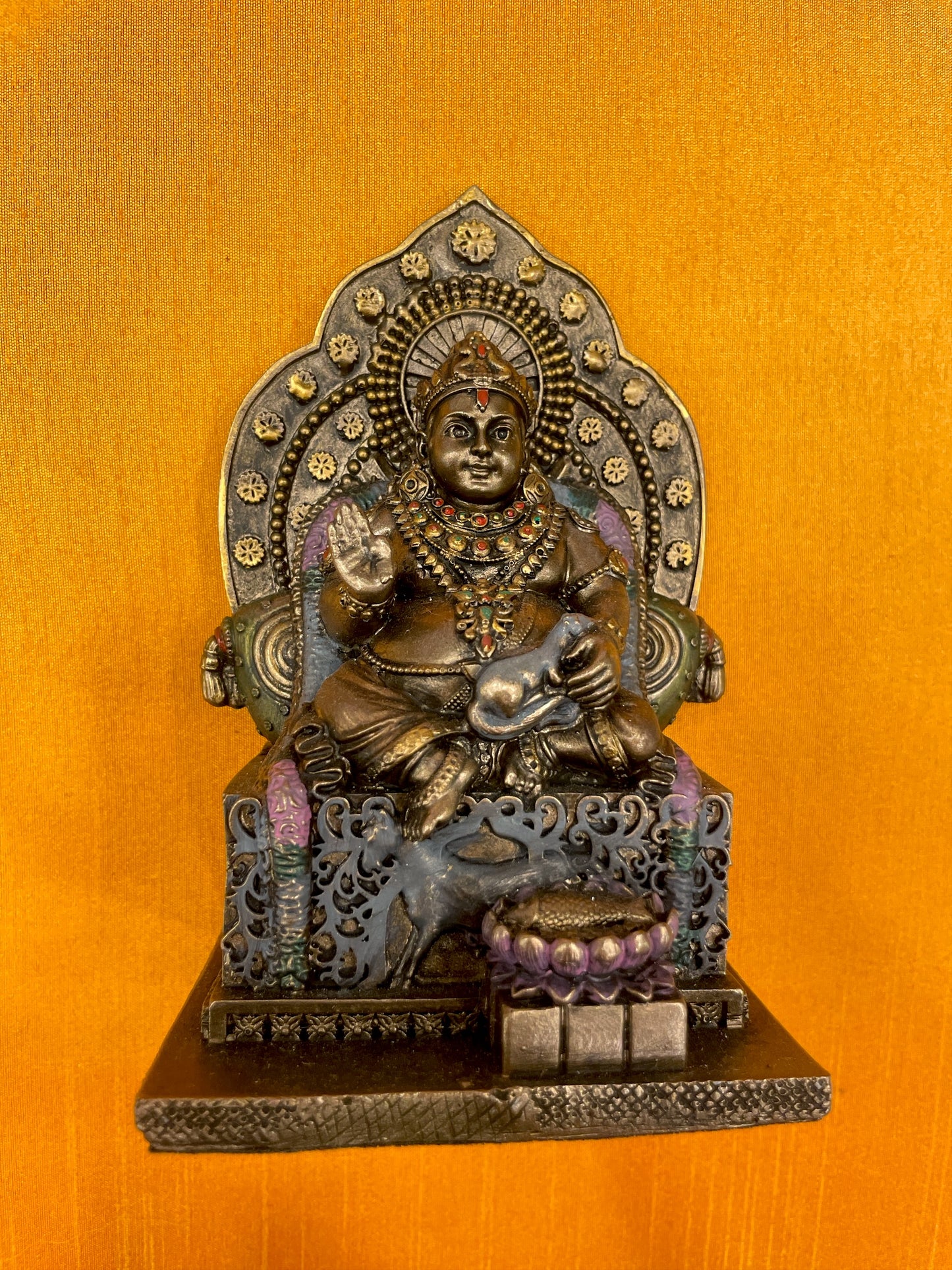 Kubera Murti Idol in Yellow silk Backdrop With Moulded Frame