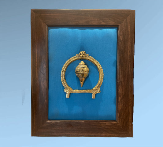 Brass Conch and Prabavali with Blue Cushion Backdrop in Brown frame