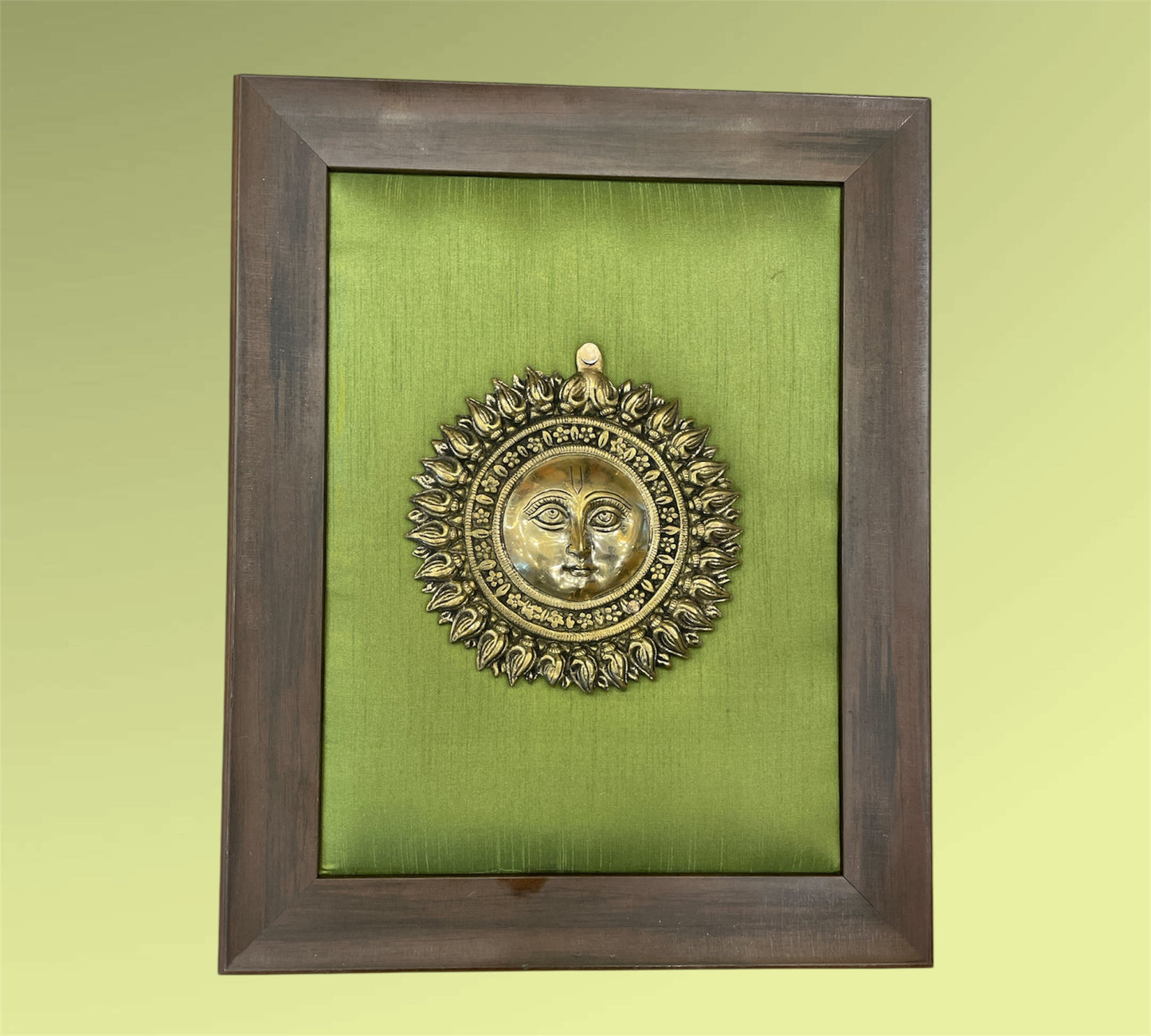 Brass Sun with Green Cushion in Brown Frame