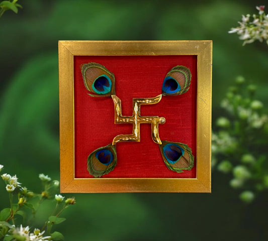 Brass Swastik With Peacock Feathers with Wine red silk in Gold frame