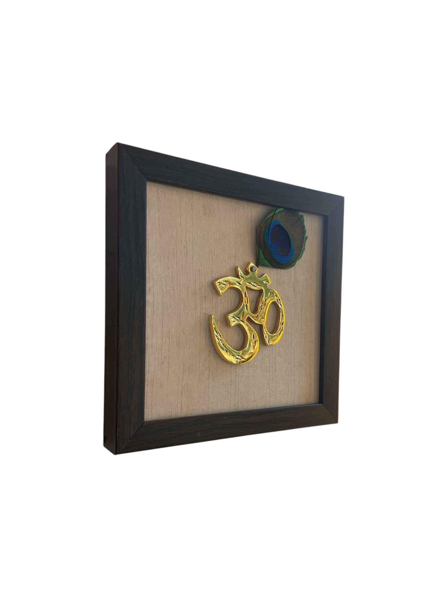 Brass Om With Peacock Feather & white Silk in Brown Frame