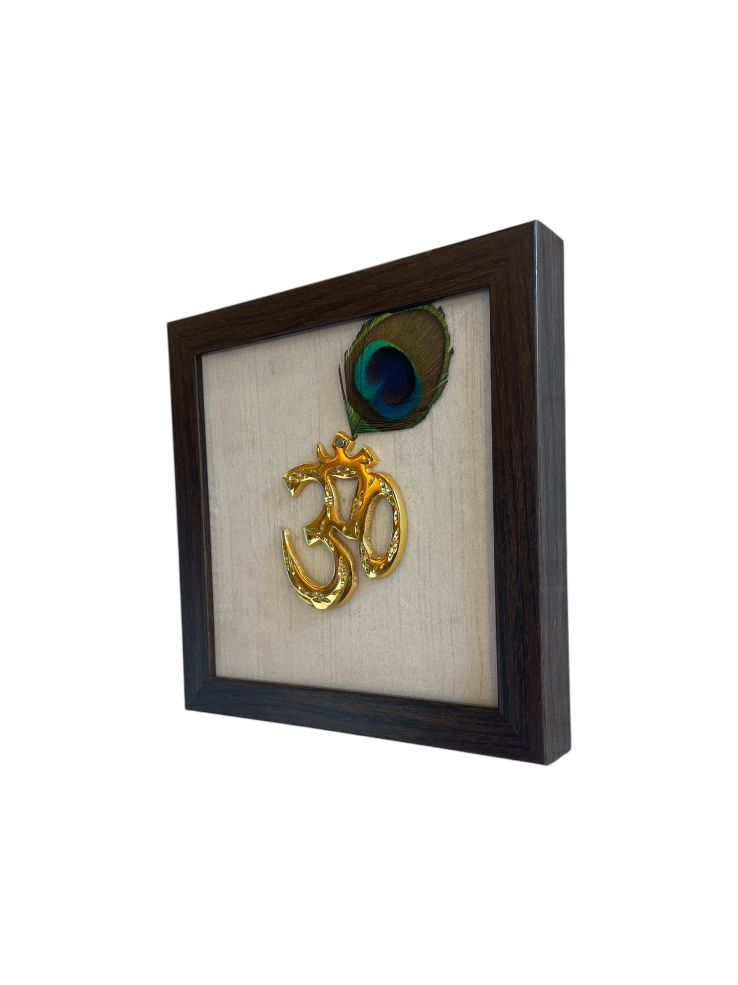 Brass Om With Peacock Feather & white Silk in Brown Frame