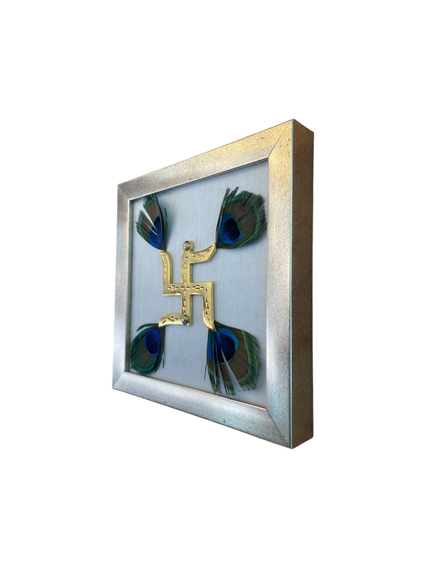 Brass Swastik with Peacock Feather and White silk in antique gold Frame