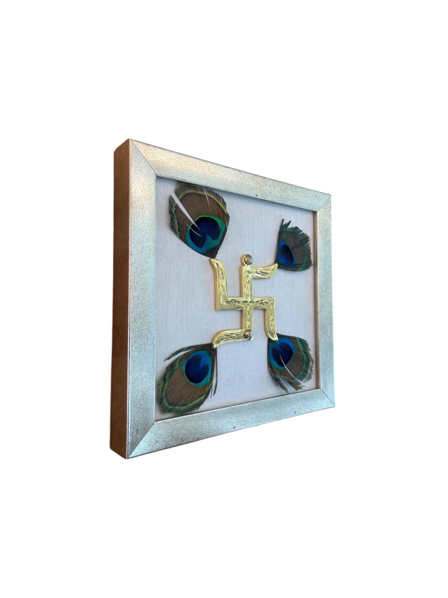 Brass Swastik with Peacock Feather and White silk in antique gold Frame