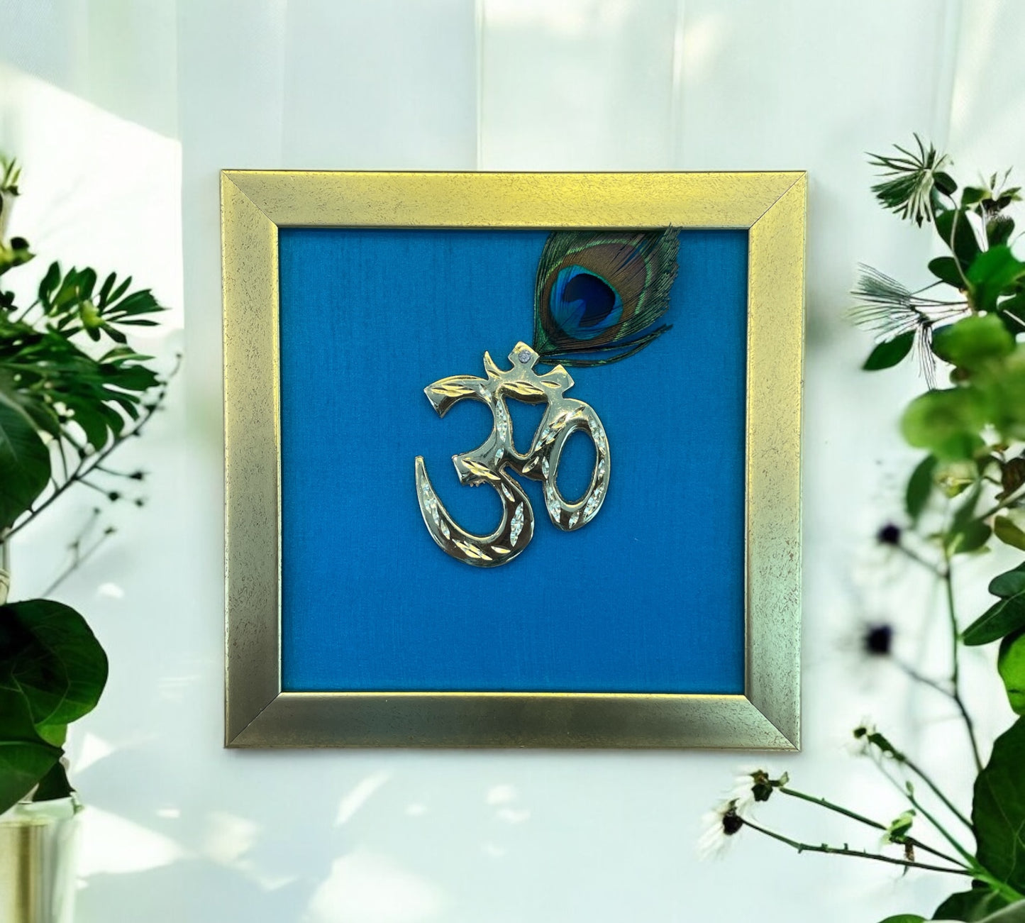 Brass Om with Peacock Feather & Blue silk in Antique Gold frame