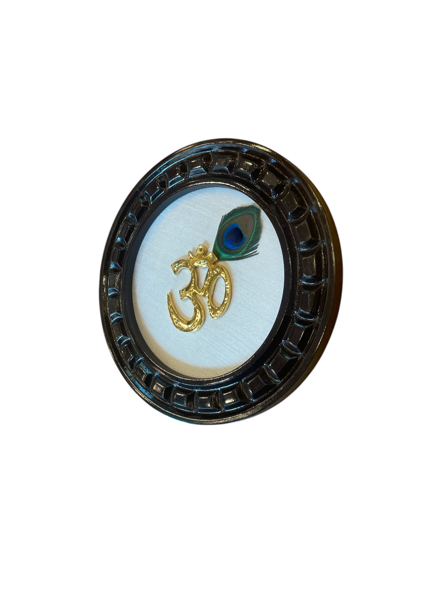 Brass Om with peacock feather & white silk Backdrop in Wooden frame