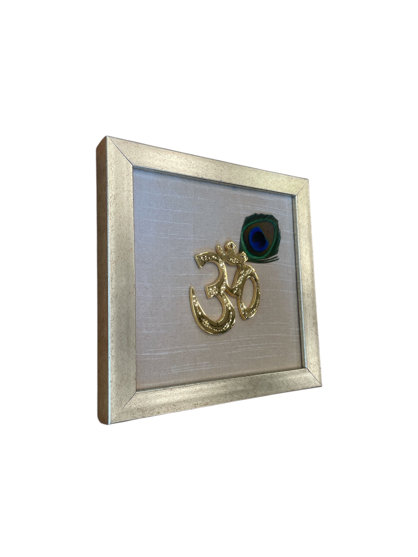 Brass Om with peacock Feather& white silk in Antique gold frame