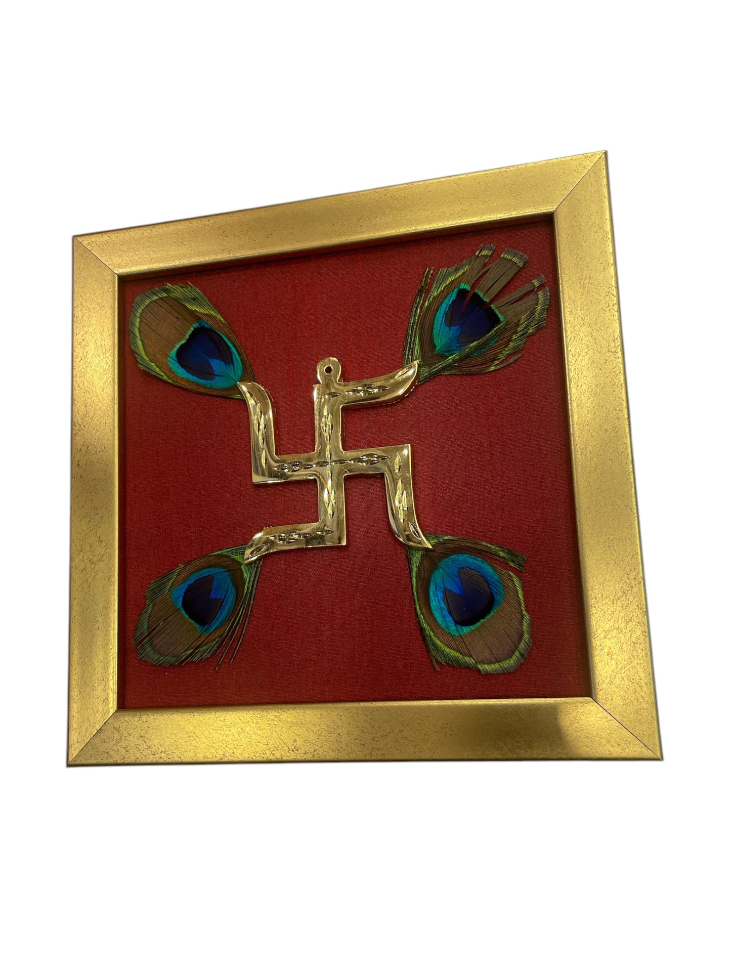 Brass Swastik with peacock feather & wine red silk in Gold frame