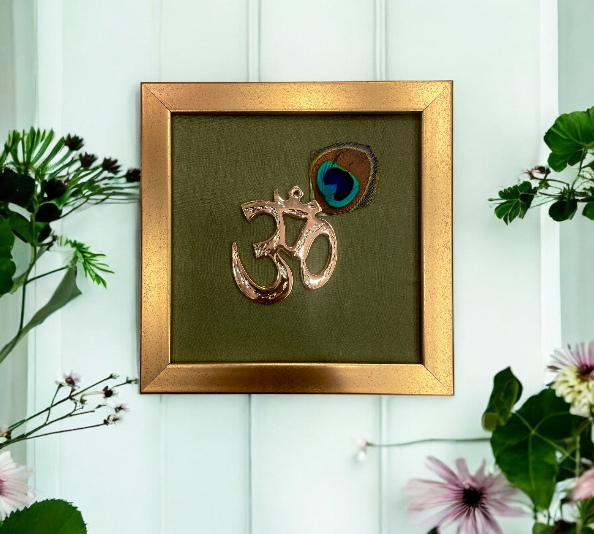 Brass Om with peacock feather & Green silk in Gold frame