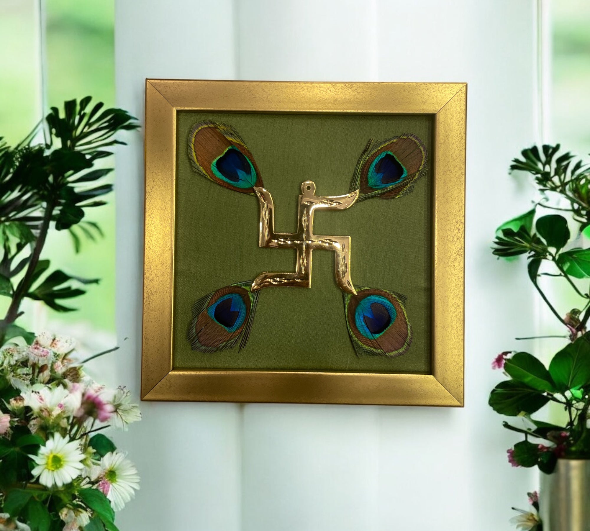 Brass Swastik with peacock feather & Green silk in Gold frame