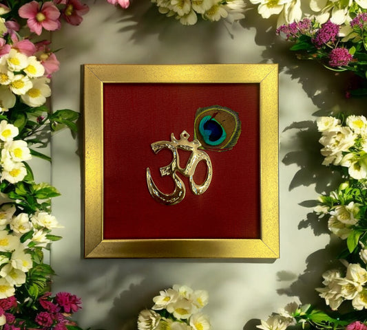 Brass Om with peacock feather & wine red silk in Gold frame