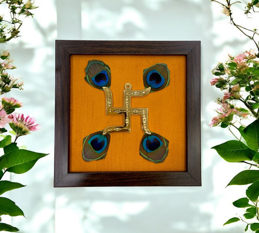 Brass Swastik with Peacock Feathers & Orange Silk in Brown frame