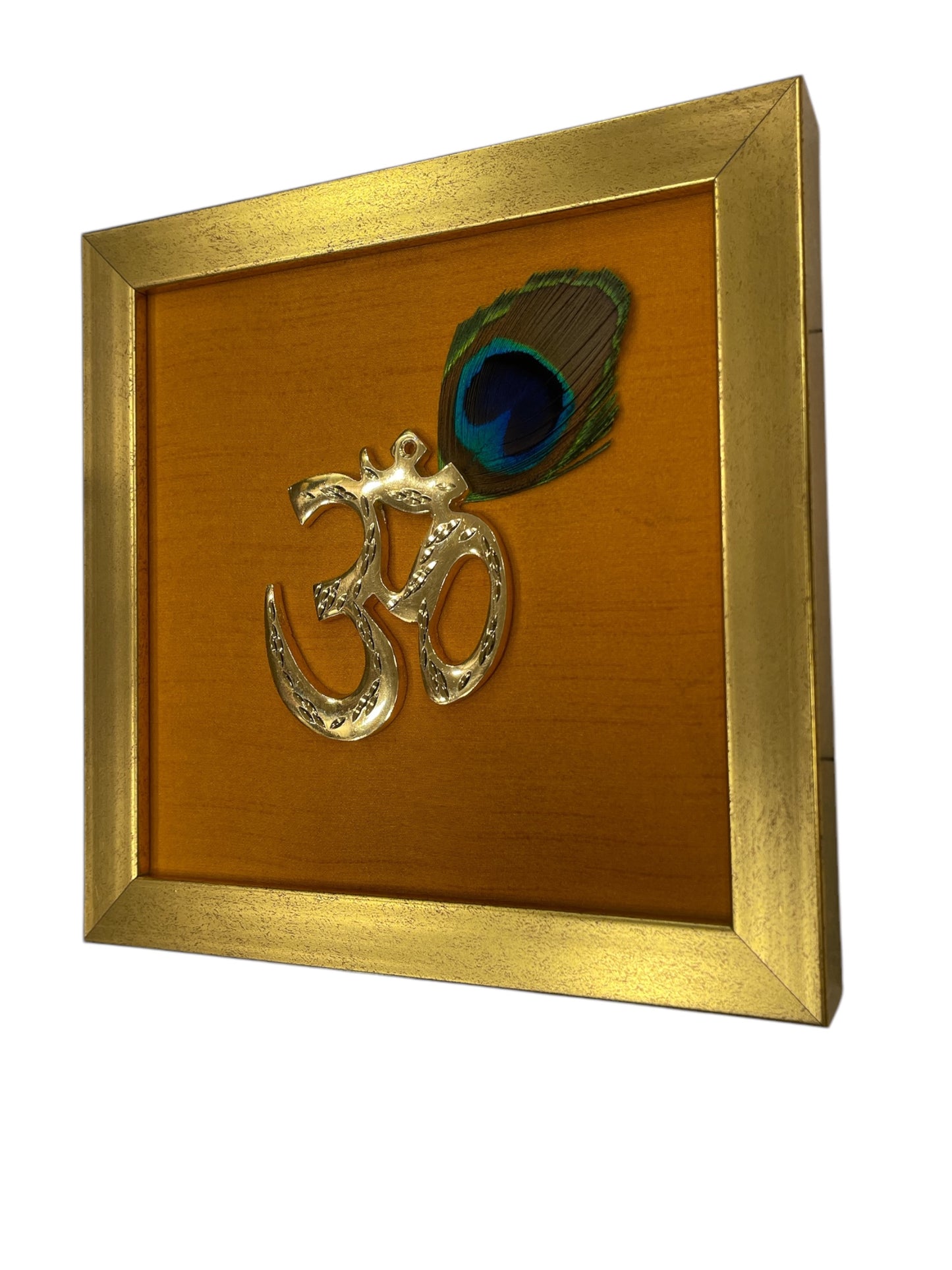 Brass Om with Peacock Feathers & Orange Silk in Gold frame