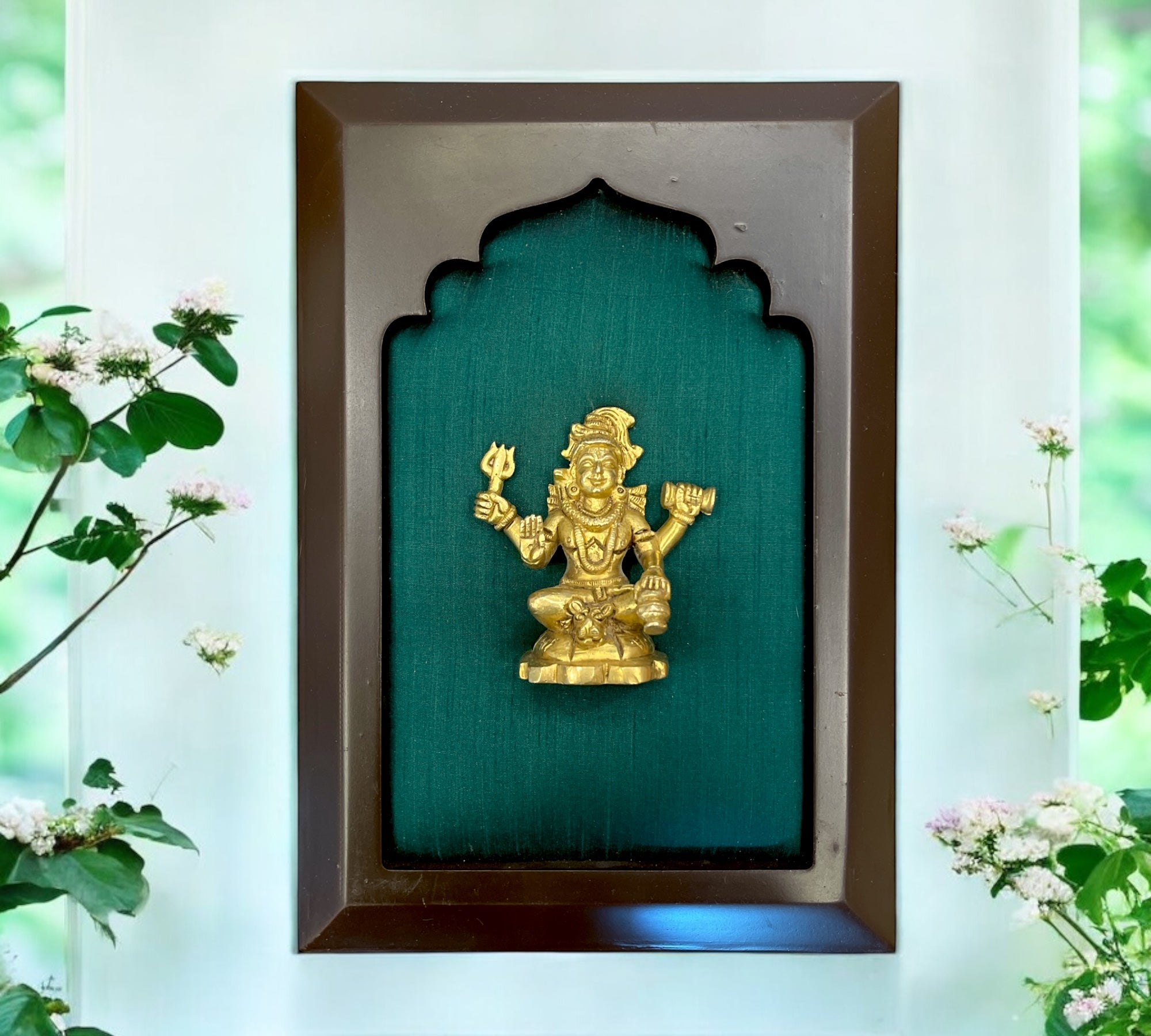 Brass Shiva with green silk in wooden frame