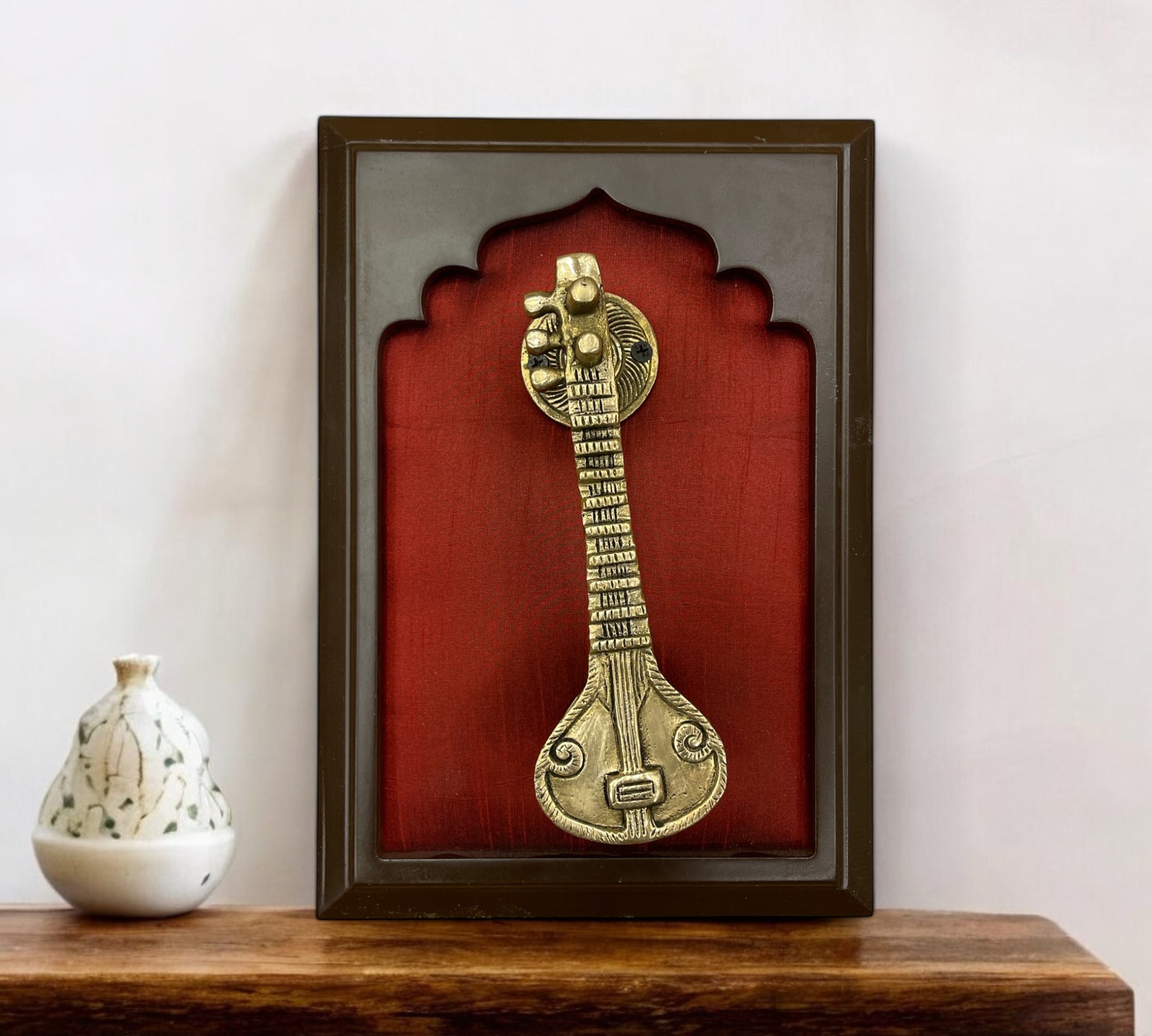 Brass Veena with Red Silk in Wooden Frame