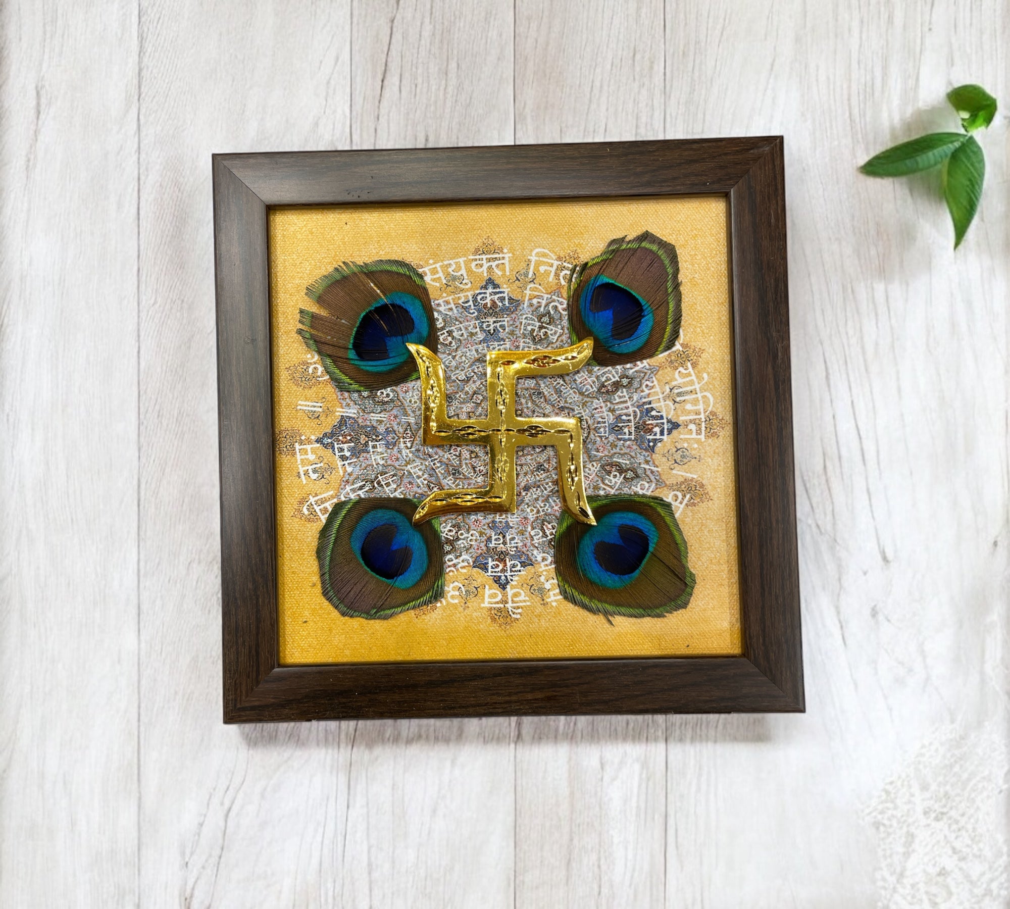 Brass Swastik with Omkara Backdrop & Peacock feather in Brown Frame