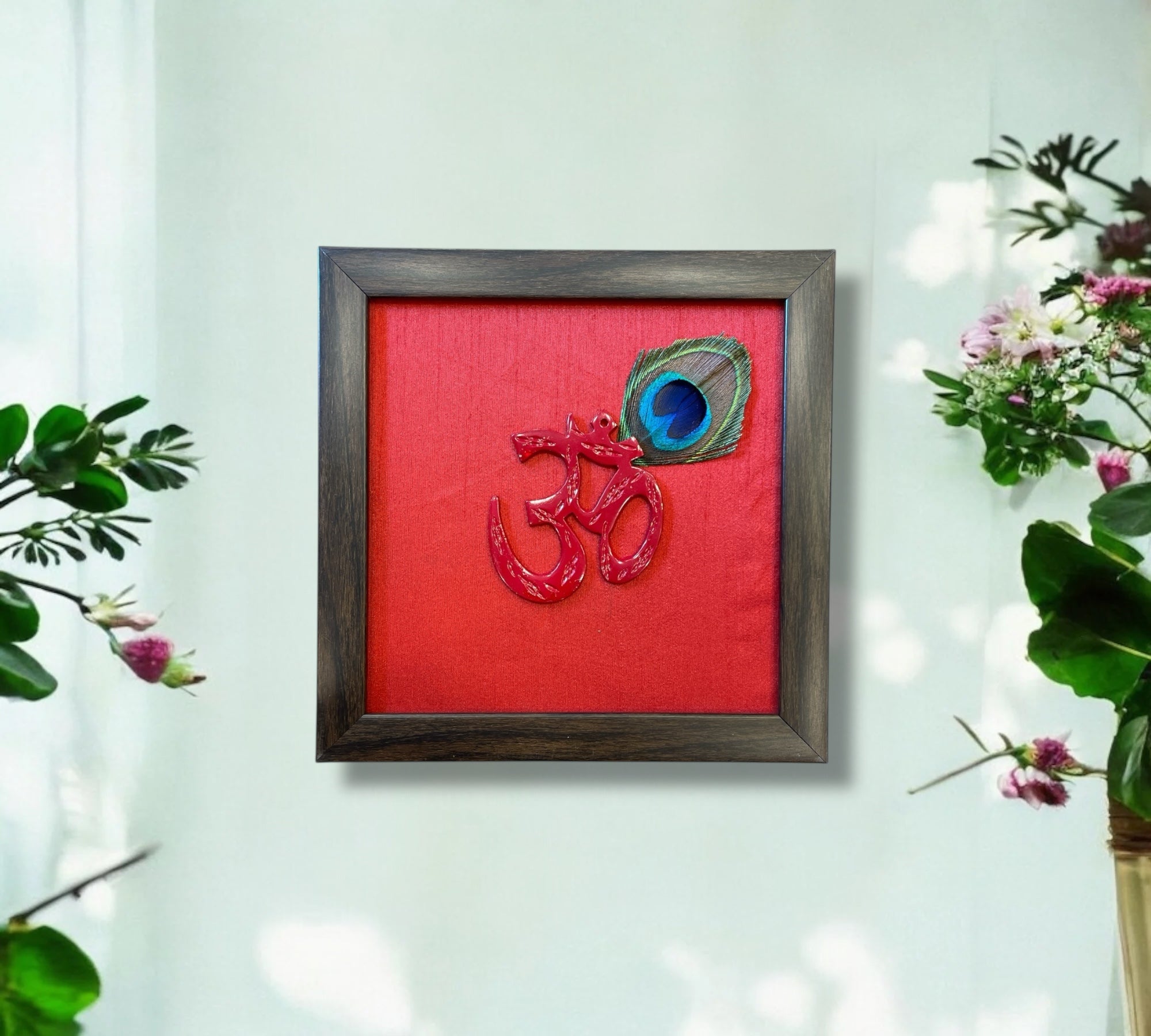 Red Om with peacock feather & Red silk in Brown frame