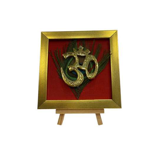 Brass Om on Peacock Feather & Red Silk with display stand