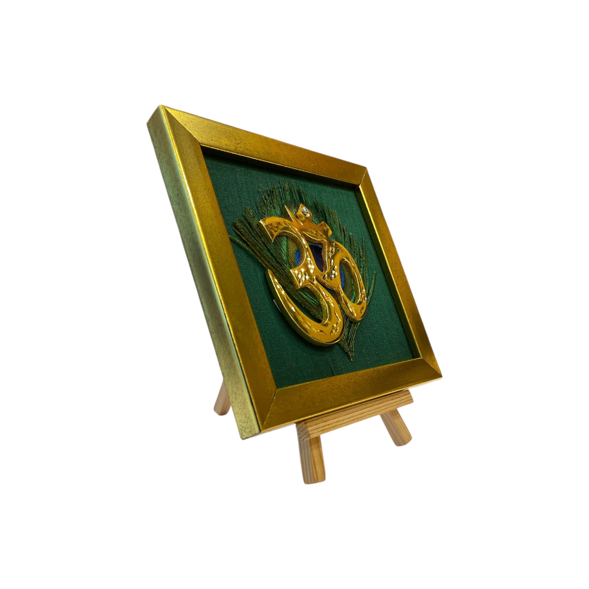 Brass Om on Peacock Feather & Green Silk with display stand