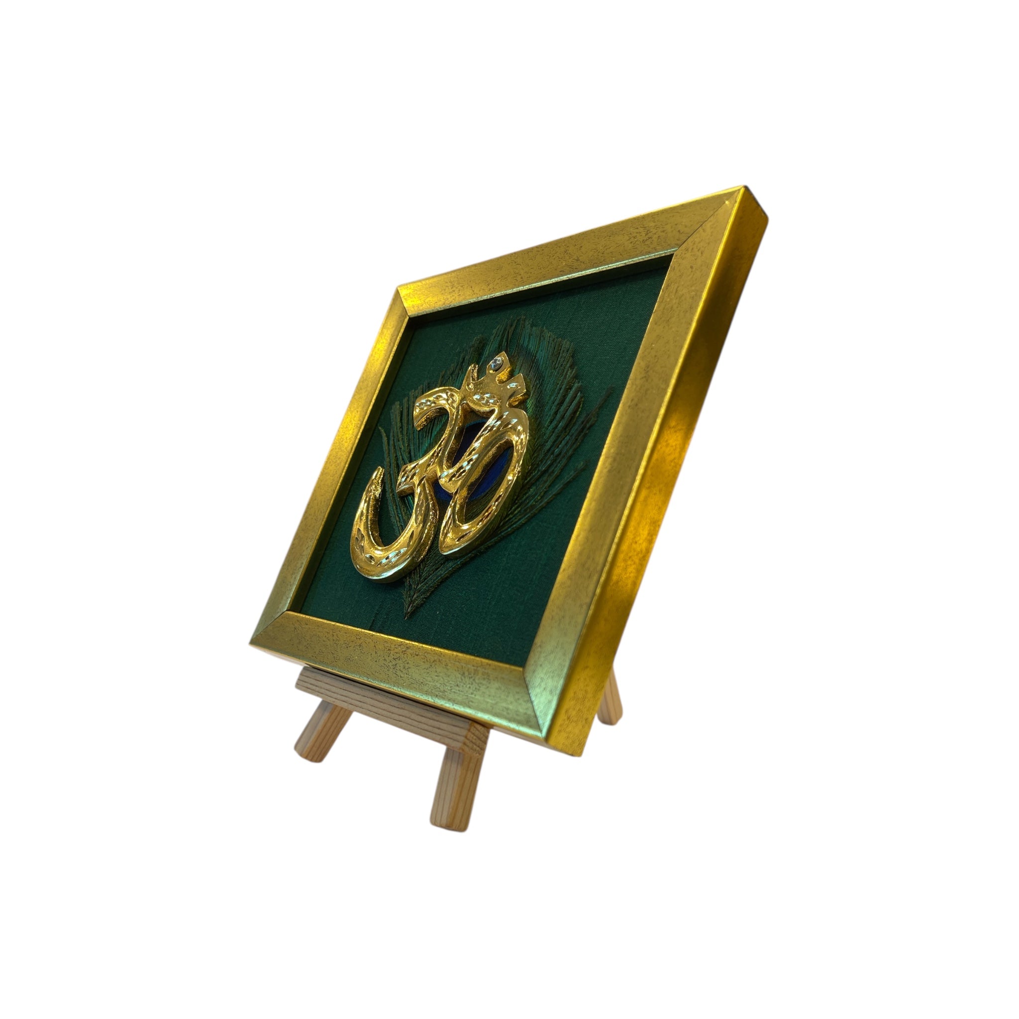 Brass Om on Peacock Feather & Green Silk with display stand