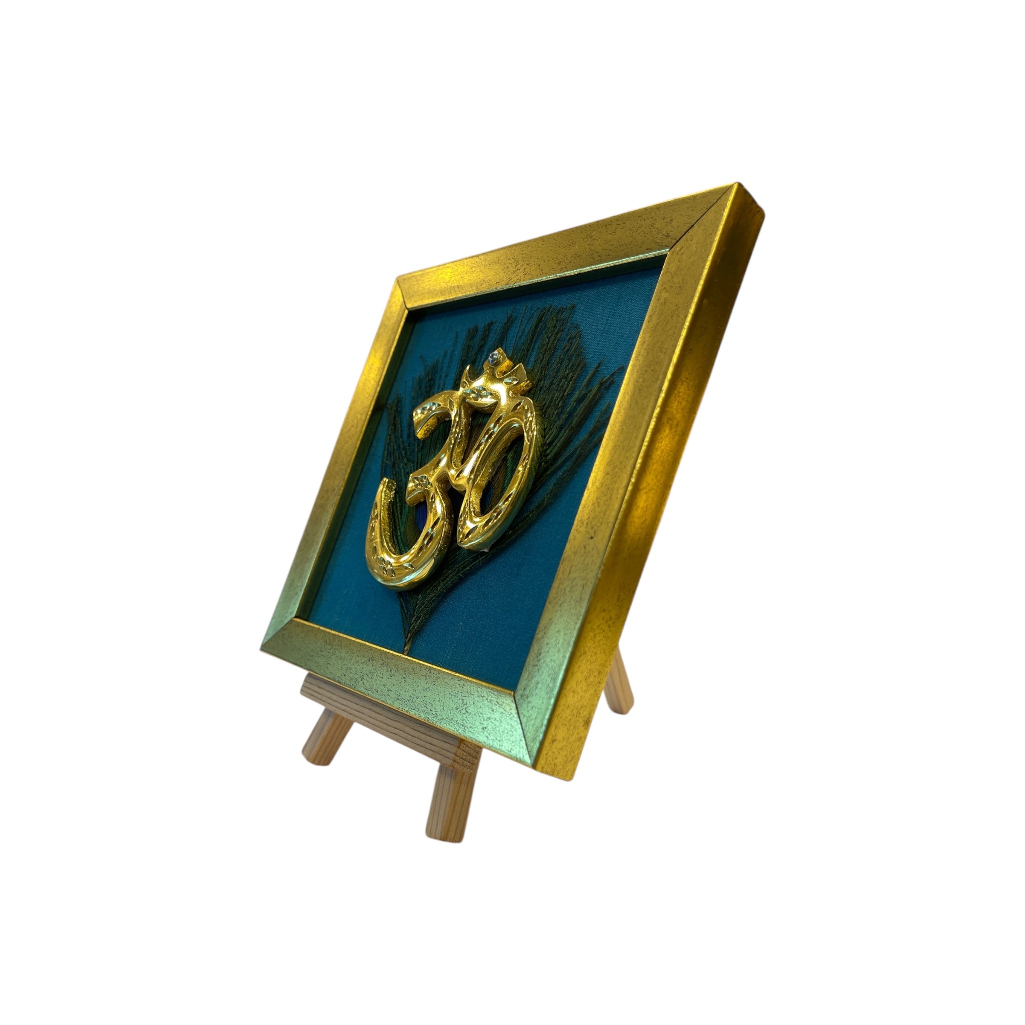 Brass Om on Peacock Feather & Blue Silk with display stand