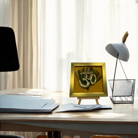 Brass Om on Peacock Feather & Yellow Silk with display stand