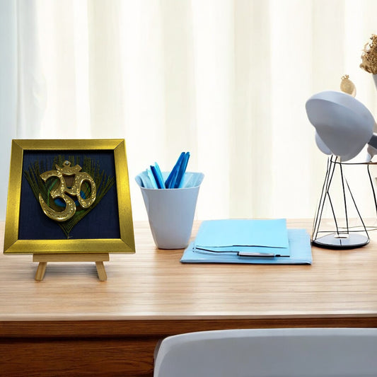 Brass Om on Peacock Feather & Indigo Silk with display stand