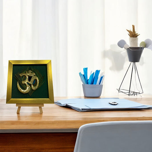 Brass Om on Peacock Feather & Green Silk with display stand