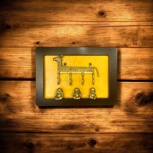 Brass Cow Key Hanger with Three Monks on Golden Silk in Wooden Frame