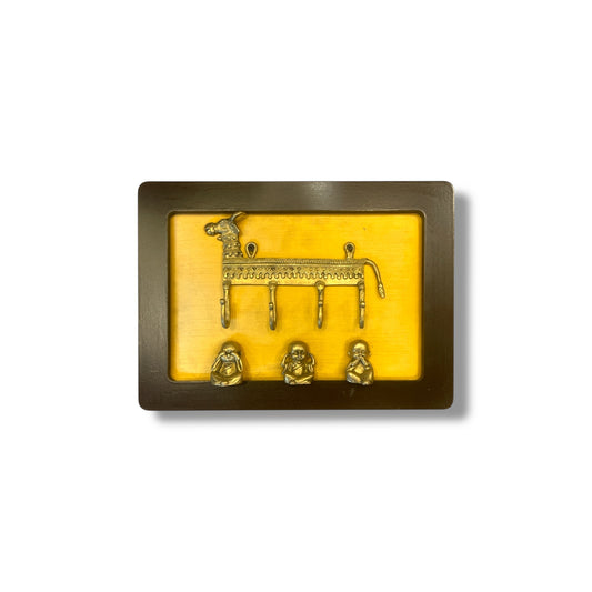 Brass Cow Key Hanger with Three Monks on Golden Silk in Wooden Frame