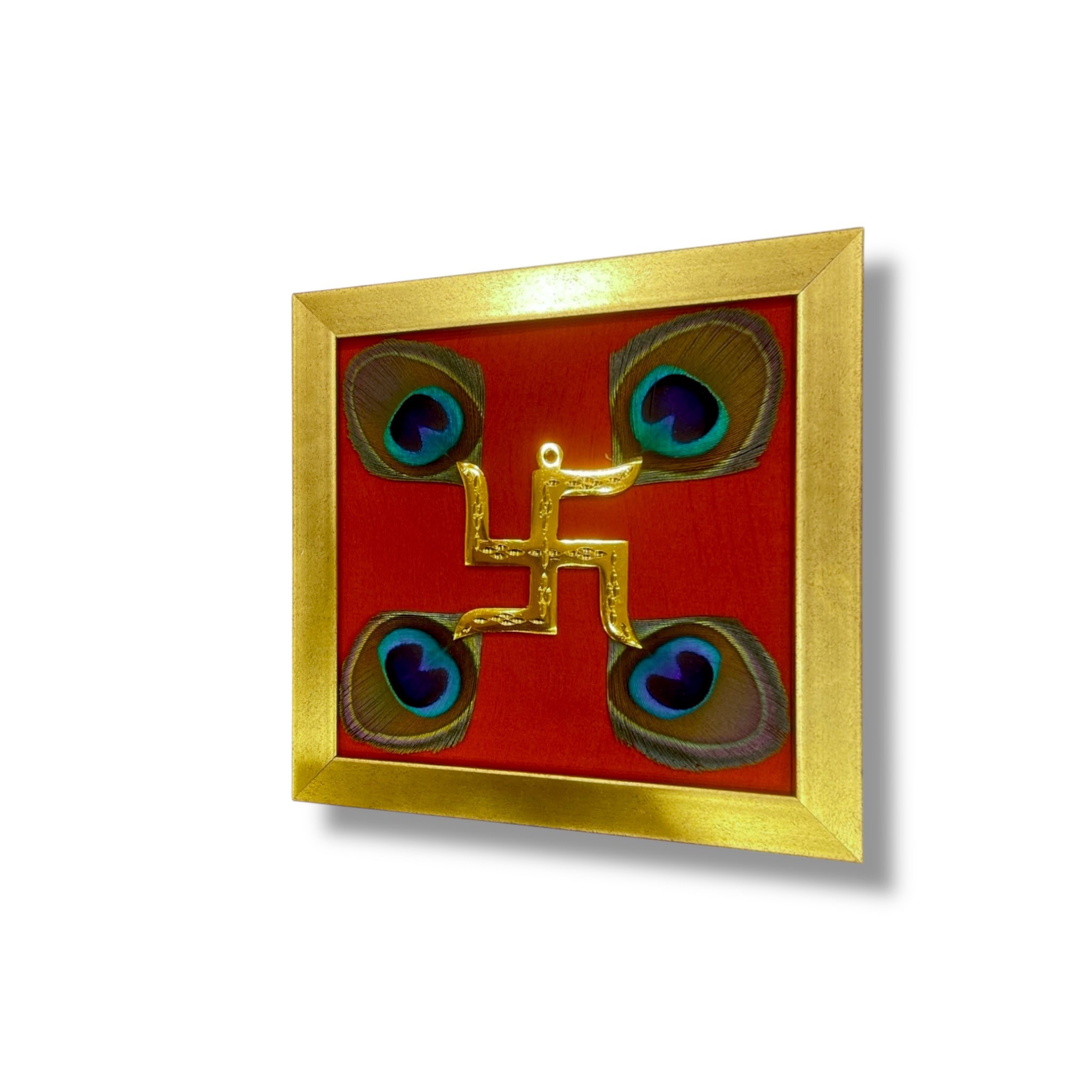 Brass Swastik With Peacock Feathers with Red silk in Gold frame