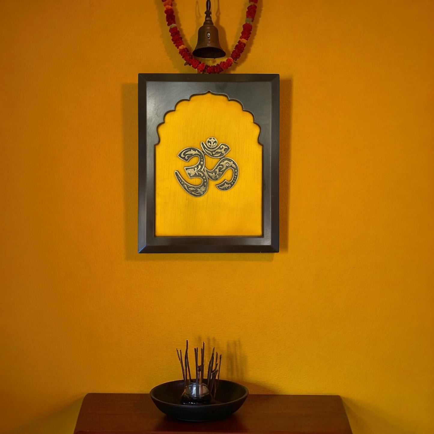 Brass Om on Golden Silk in Wooden frame