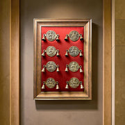 Brass Ashtalakshmi with wine Red Cushion in moulded frame.